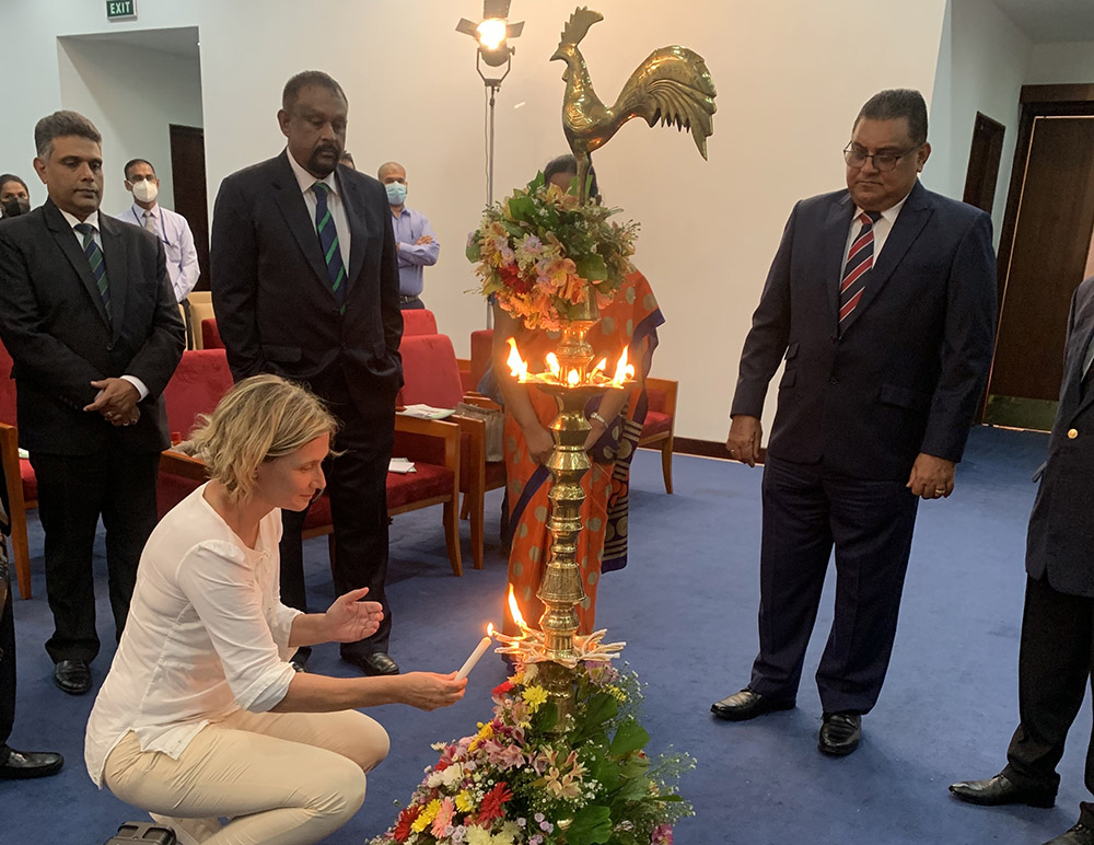 The Centre's CEO lights an oil lamp to mark the launch of Mother and Child Friendly Seal for Responsible Business in Sri Lanka on June 15, 2022